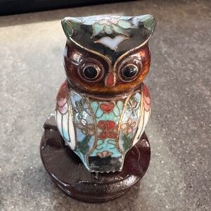 Vintage Chinese cloisonné owl figurine on a wooden stand
